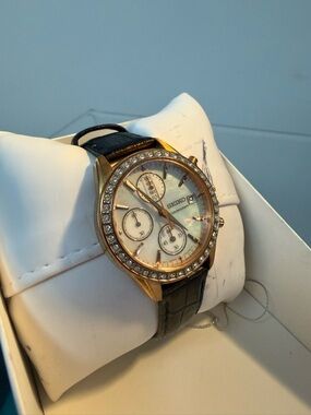 Seiko Gold-Tone Watch with Black Strap and Crystal Bezel